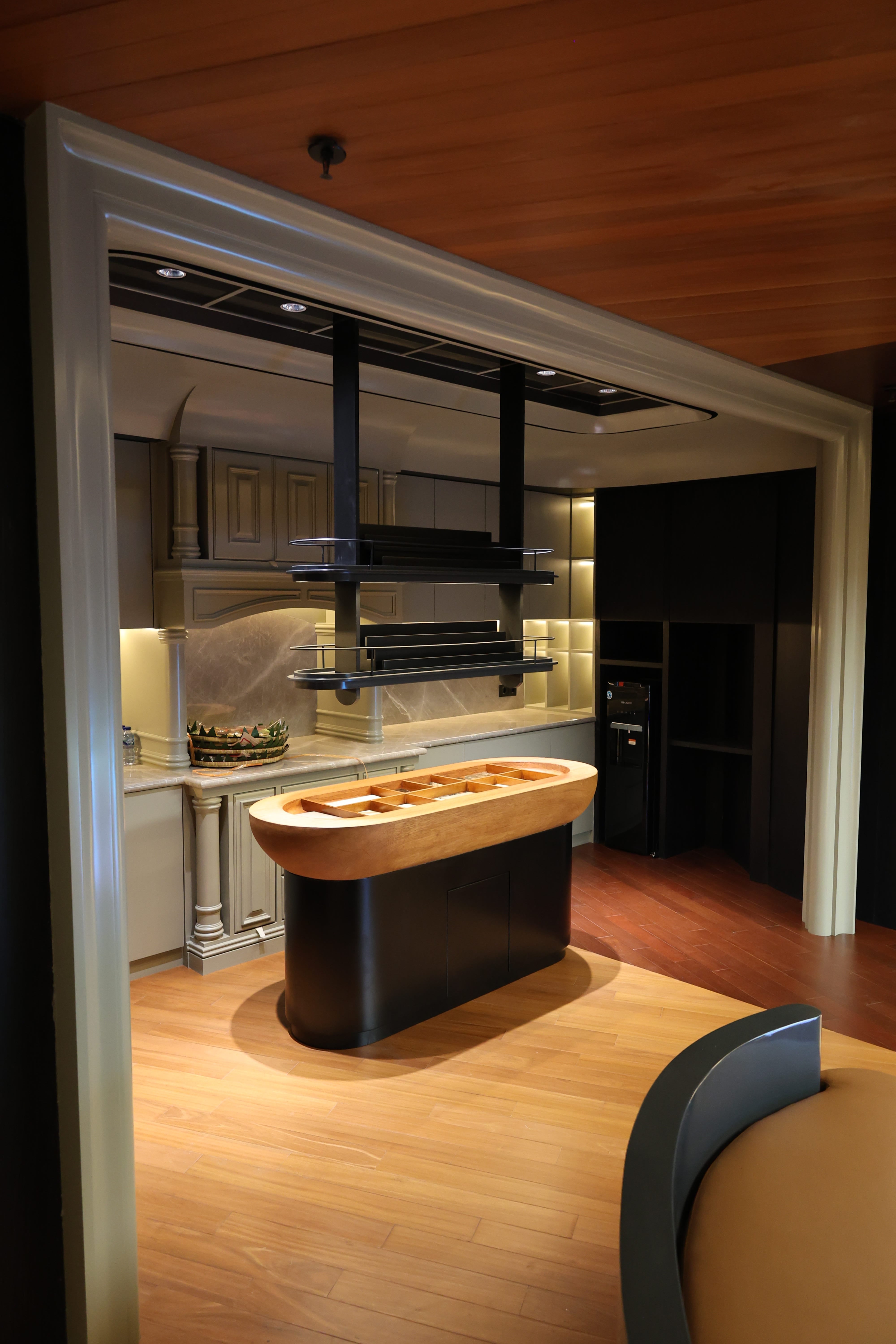 Furniture display area with dining table and chairs at Reywood Indonesia showroom