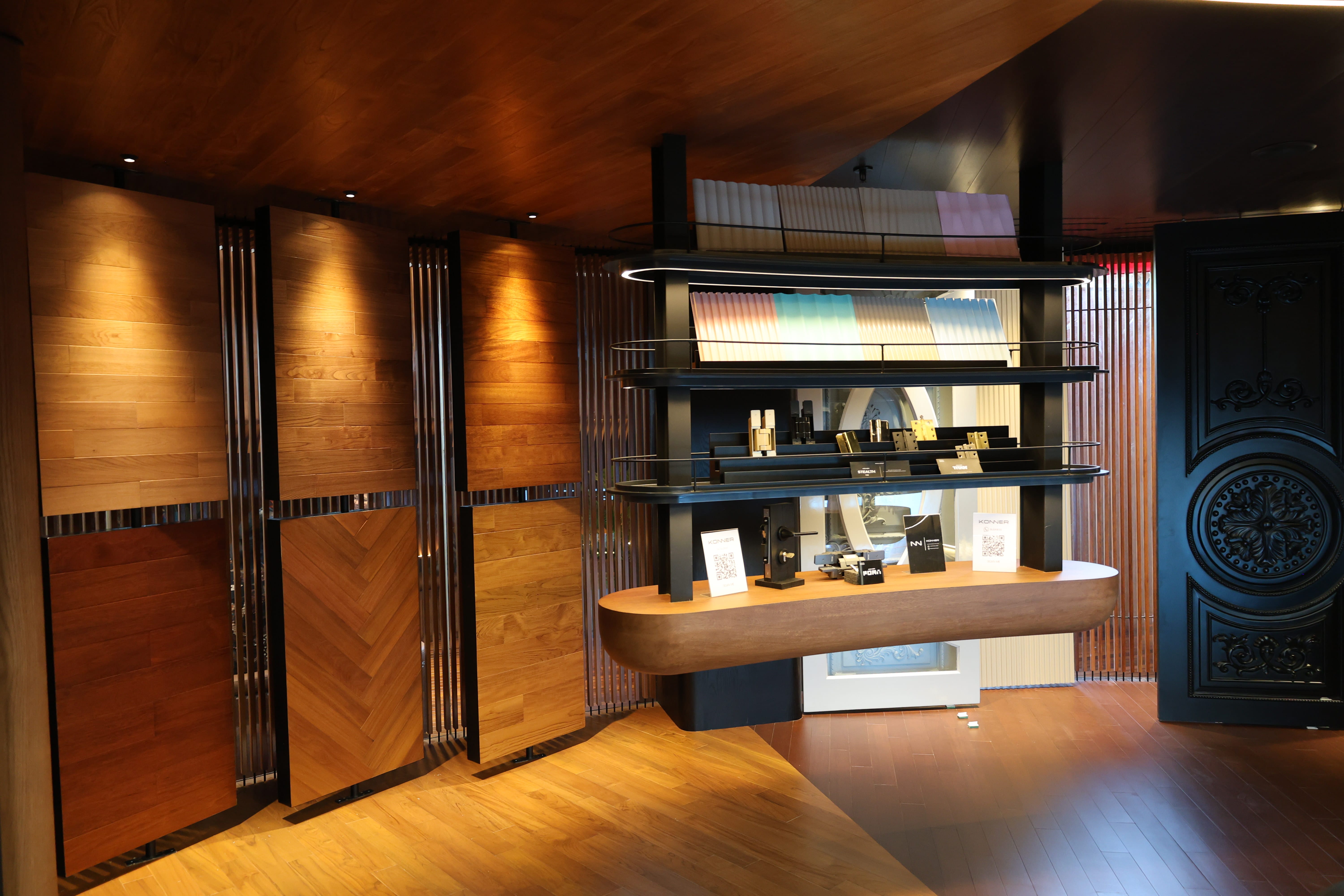 Large wood flooring and wall panel displays in multiple species and finishes at Reywood showroom
